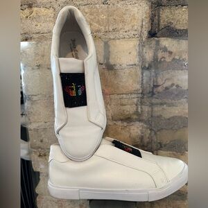 🛍️ Juicy Couture White Slip-On Sneakers with Black and Red Detail